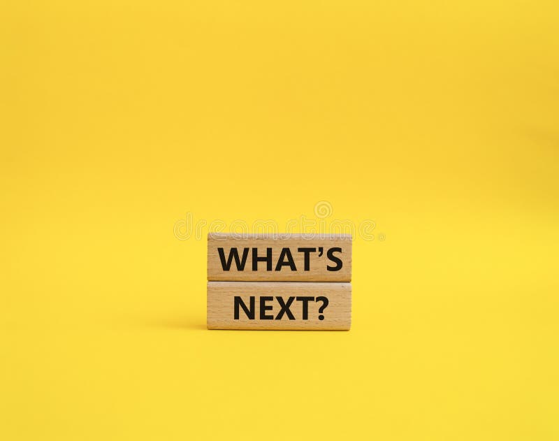 What is next symbol. Concept word What is next on wooden blocks. Beautiful orange background. Business and What is next concept. Copy space. What is next symbol. Concept word What is next on wooden blocks. Beautiful orange background. Business and What is next concept. Copy space