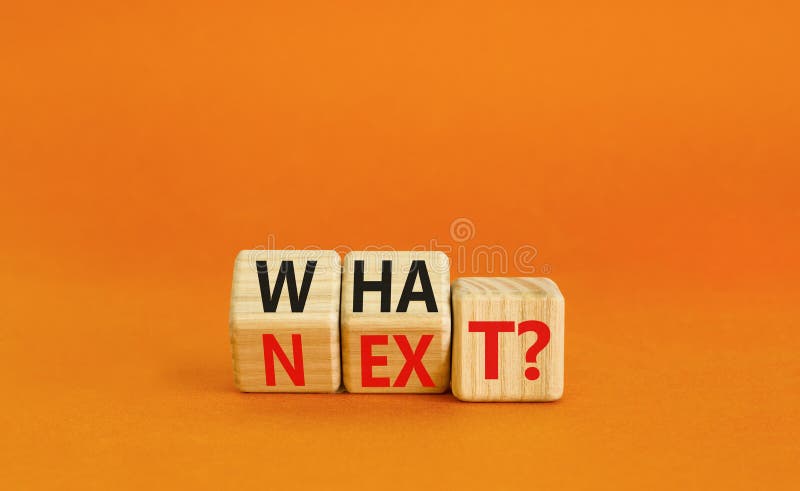 What next symbol. Concept words What next on wooden blocks. Changed words what to next. Beautiful orange table orange background. Business What next concept. Copy space. What next symbol. Concept words What next on wooden blocks. Changed words what to next. Beautiful orange table orange background. Business What next concept. Copy space