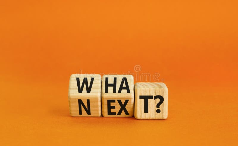 What next symbol. Concept words What next on wooden blocks. Changed words what to next. Beautiful orange table orange background. Business What next concept. Copy space. What next symbol. Concept words What next on wooden blocks. Changed words what to next. Beautiful orange table orange background. Business What next concept. Copy space