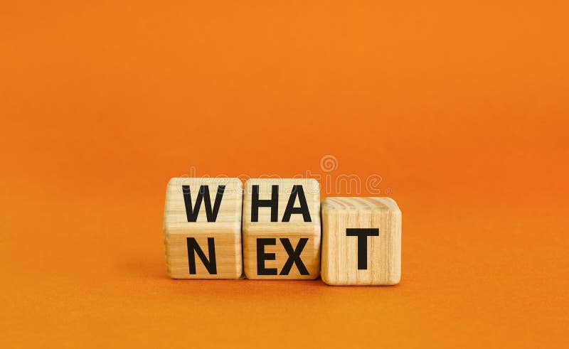 What next symbol. Concept words What next on wooden blocks. Changed words what to next. Beautiful orange table orange background. Business What next concept. Copy space. What next symbol. Concept words What next on wooden blocks. Changed words what to next. Beautiful orange table orange background. Business What next concept. Copy space