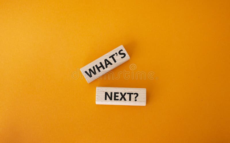 What is next symbol. Concept words What is next on wooden blocks. Beautiful orange background. Business and What is next concept. Copy space. What is next symbol. Concept words What is next on wooden blocks. Beautiful orange background. Business and What is next concept. Copy space