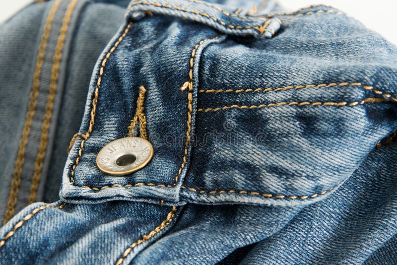 Närbild av ett par jeans med ordet arkivbilder Närbild av ett par jeans med ordet arkivbilder