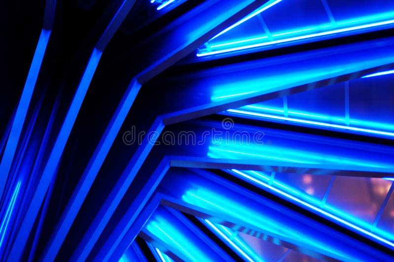 The blue neon in this staircase design creates an interesting abstract. The blue neon in this staircase design creates an interesting abstract.