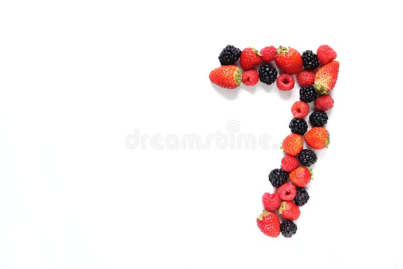 Number seven made from strawberry, raspberry and blackberry fresh fruits. Number seven made from strawberry, raspberry and blackberry fresh fruits