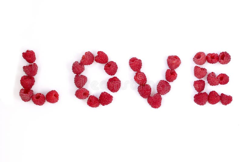 O amor da palavra fez da framboesa letras da baga fotos de stock O amor da palavra fez da framboesa letras da baga fotos de stock