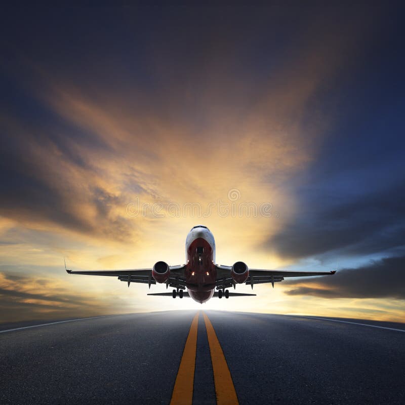 Passenger plane take off from runways against beautiful dusky sky with copy space use for air transport ,journey and traveling industry business. Passenger plane take off from runways against beautiful dusky sky with copy space use for air transport ,journey and traveling industry business