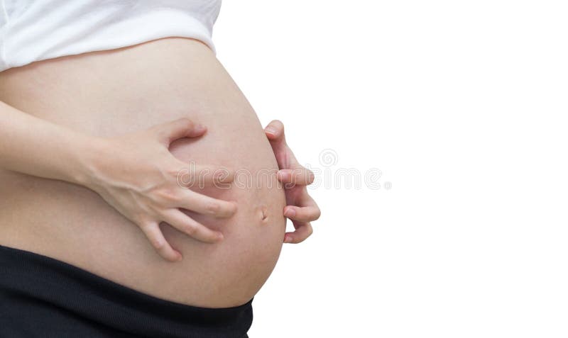 O comichão, dor da barriga grávida, isolada contra o fundo branco imagem de stock O comichão, dor da barriga grávida, isolada contra o fundo branco imagem de stock