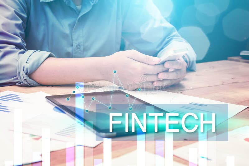 O conceito financeiro de FinTech da tecnologia com startup novo equipa-nos fotografia de stock royalty free O conceito financeiro de FinTech da tecnologia com startup novo equipa-nos fotografia de stock royalty free