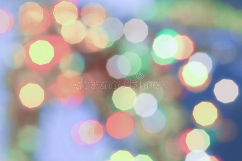O delicado coloriu o fundo do feriado do sumário da luz do bokeh do Natal imagem de stock O delicado coloriu o fundo do feriado do sumário da luz do bokeh do Natal imagem de stock