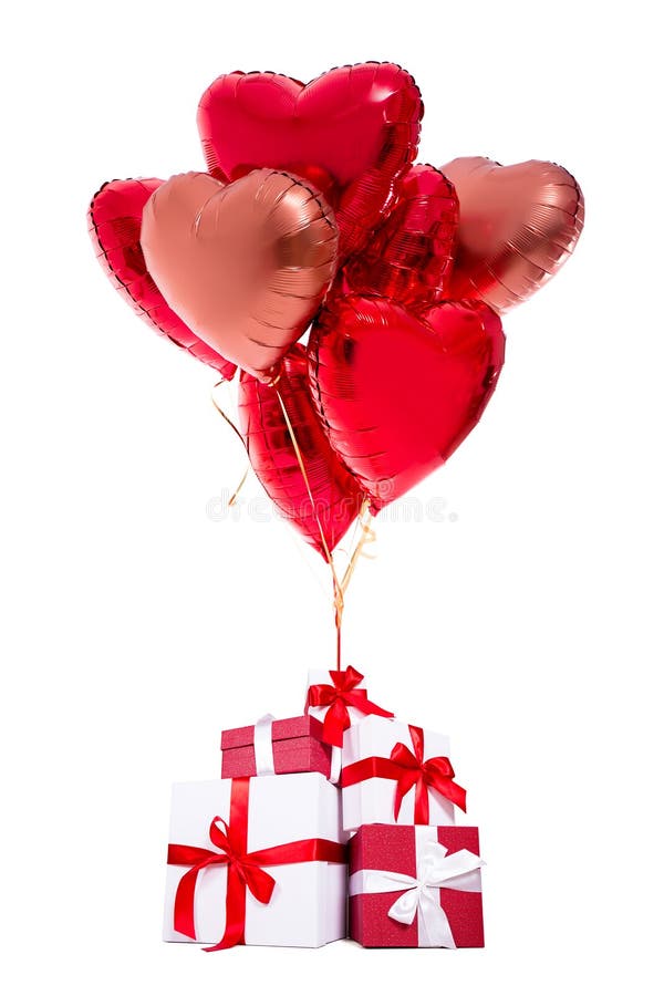 Valentine`s day or birthday concept - gift boxes with red balloons isolated on white background. Valentine`s day or birthday concept - gift boxes with red balloons isolated on white background