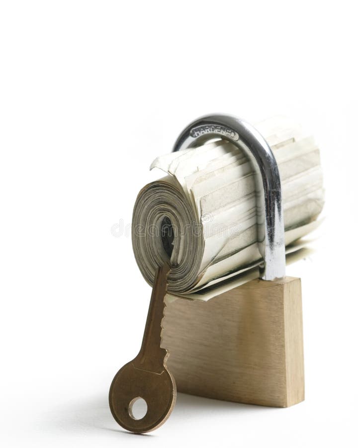 O dinheiro rolou em um cadeado imagens de stock O dinheiro rolou em um cadeado imagens de stock