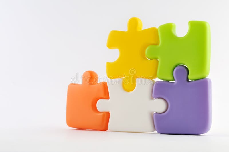 Peças de puzzle juntas fotografia de stock royalty free