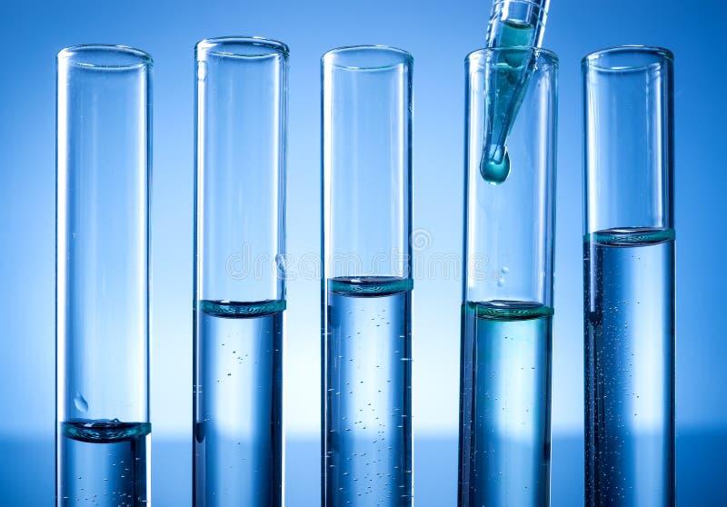 Laboratory equipment, test tubes line, a drop of liquid . Laboratory equipment, test tubes line, a drop of liquid .