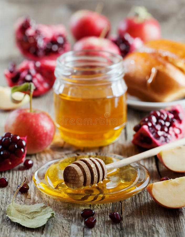 O hala do mel, da maçã, da romã e do pão, tabela ajustou-se com alimento tradicional para o feriado judaico do ano novo, Rosh Has