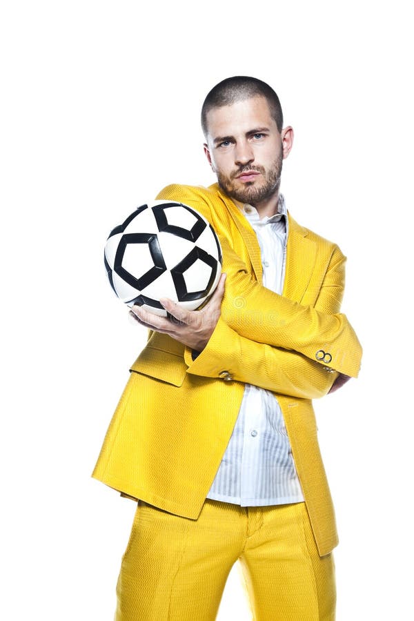 O homem de negócios é uma bola grande dos apertos do fanbusinessman do fotball, isolada no fundo branco imagem de stock O homem de negócios é uma bola grande dos apertos do fanbusinessman do fotball, isolada no fundo branco imagem de stock