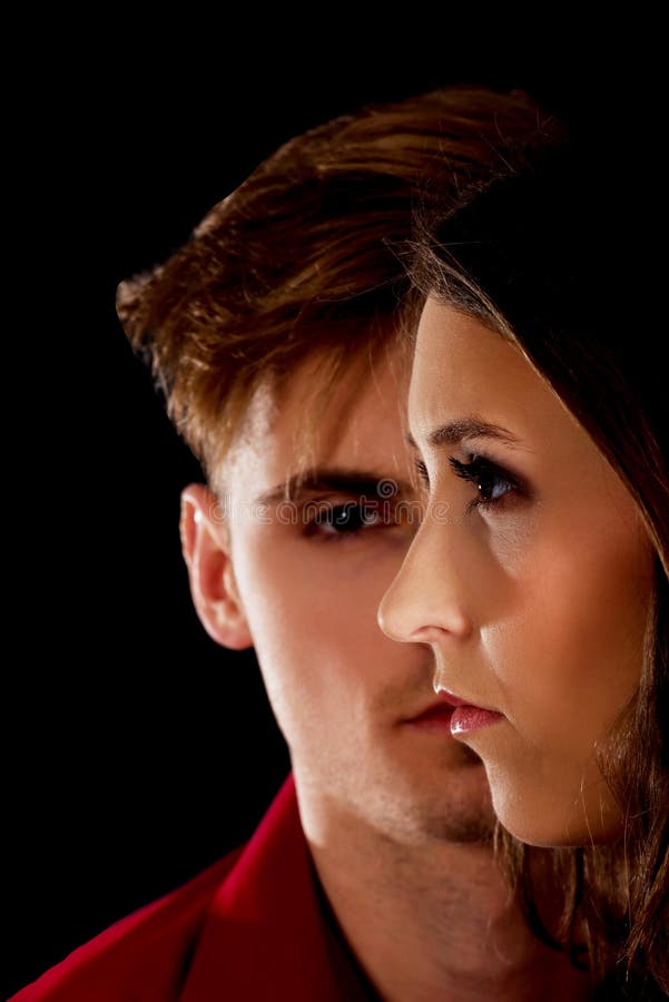 O homem é vista séria em uma mulher imagem de stock royalty free O homem é vista séria em uma mulher imagem de stock royalty free