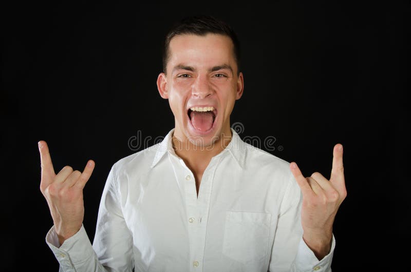 O indivíduo considerável novo está enganando ao redor Gesto do dedo fotos de stock O indivíduo considerável novo está enganando ao redor Gesto do dedo fotos de stock