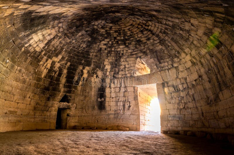 The archaeological site of Mycenae near the village of Mykines, with ancient tombs, giant walls and the famous lions gate, Peloponnese, Greece. The archaeological site of Mycenae near the village of Mykines, with ancient tombs, giant walls and the famous lions gate, Peloponnese, Greece