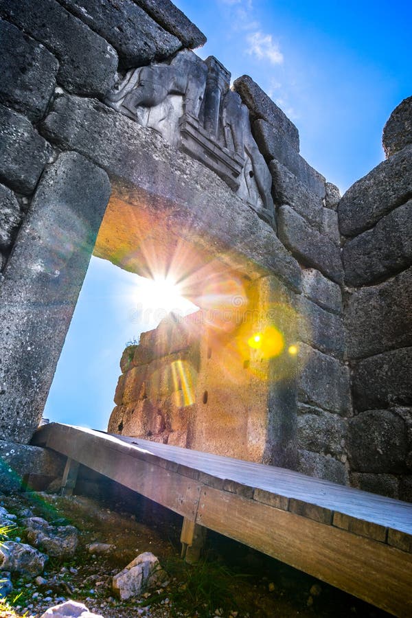 The archaeological site of Mycenae near the village of Mykines, with ancient tombs, giant walls and the famous lions gate, Peloponnese, Greece. The archaeological site of Mycenae near the village of Mykines, with ancient tombs, giant walls and the famous lions gate, Peloponnese, Greece