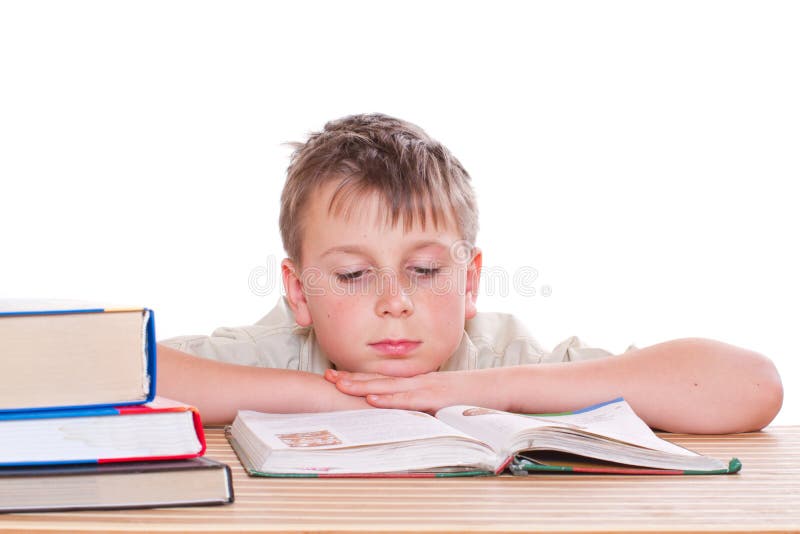 Boy learns lessons on a white background. Boy learns lessons on a white background