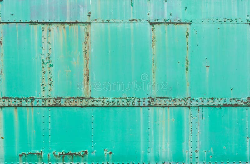 O metal oxidado verde pintou o fundo, textura do grunge, superfície do trem foto de stock O metal oxidado verde pintou o fundo, textura do grunge, superfície do trem foto de stock