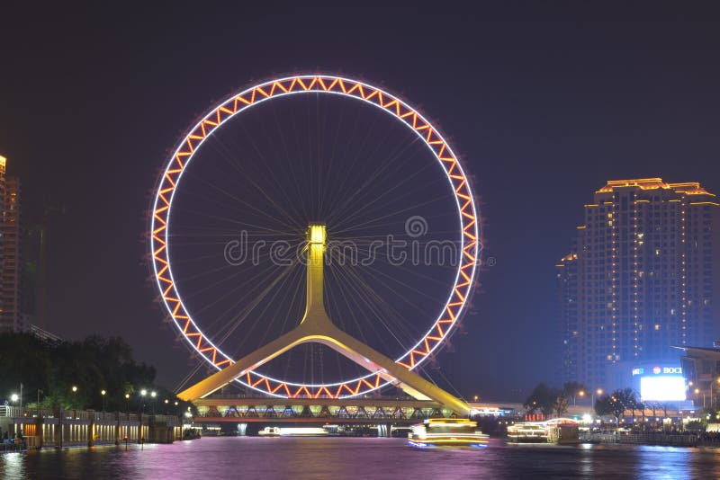 O nightscape do olho de Tianjin imagem de stock O nightscape do olho de Tianjin imagem de stock