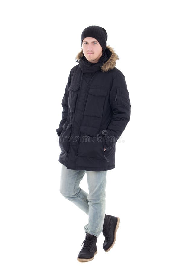 O retrato do homem considerável novo no revestimento preto do inverno isolou o imagem de stock O retrato do homem considerável novo no revestimento preto do inverno isolou o imagem de stock