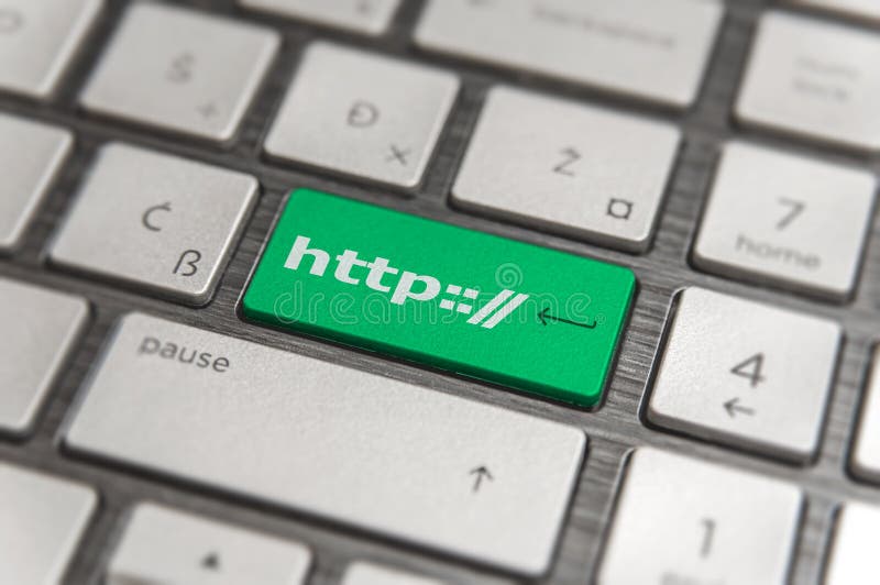 O teclado com chave verde incorpora e exprime o texto moderno do PC do botão do HTTP foto de stock O teclado com chave verde incorpora e exprime o texto moderno do PC do botão do HTTP foto de stock