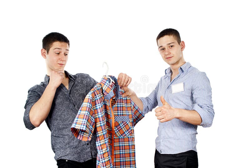 O vendedor recomenda o comprador fotografia de stock O vendedor recomenda o comprador fotografia de stock