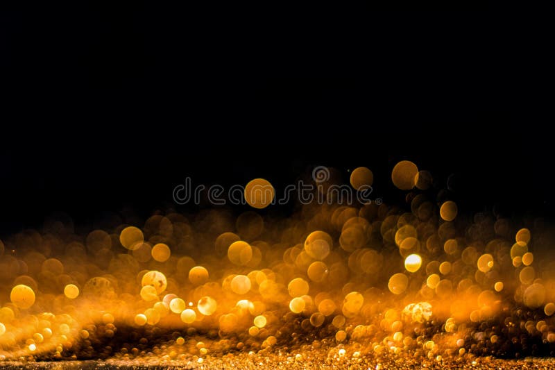 O vintage do brilho ilumina o fundo Ouro e preto De focalizado imagens de stock royalty free O vintage do brilho ilumina o fundo Ouro e preto De focalizado imagens de stock royalty free