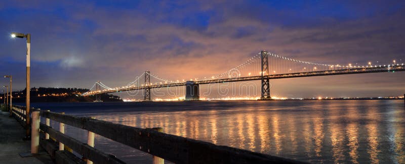 Oakland Bay Bridge lights in dusk in San Francisco, California. Oakland Bay Bridge lights in dusk in San Francisco, California.