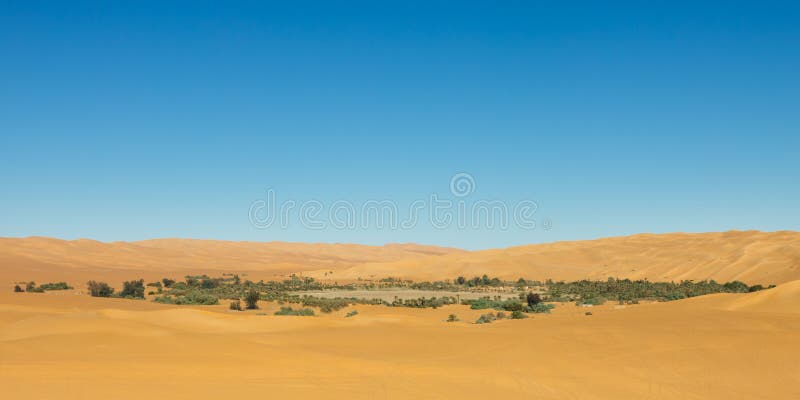 Dried up Lake Mandara - Idyllic oasis in the Awbari Sand Sea, Sahara Desert, Libya. Dried up Lake Mandara - Idyllic oasis in the Awbari Sand Sea, Sahara Desert, Libya