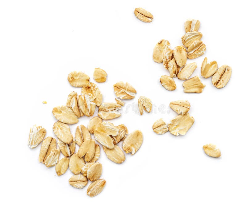 Oat flakes isolated on white background. Pile of oatmeal  top view