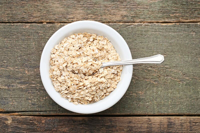 Oat flakes in plate stock image. Image of delicious - 106372361