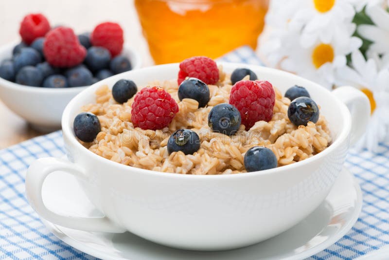 Oat Porridge with Berries, Close-up Stock Photo - Image of background ...