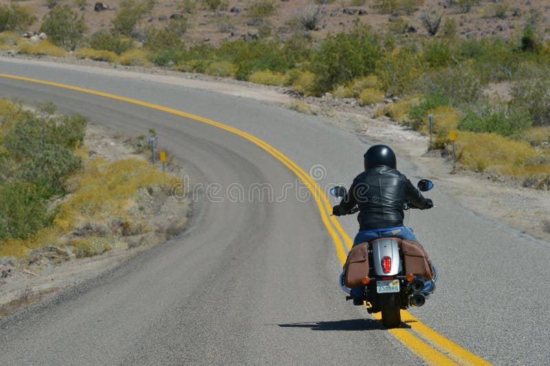 Biker on Route 66 Oatman Road, USA. Biker on Route 66 Oatman Road, USA