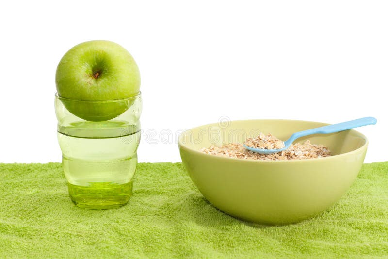 Oatmeal, apple and water stock image. Image of muesli 35861203