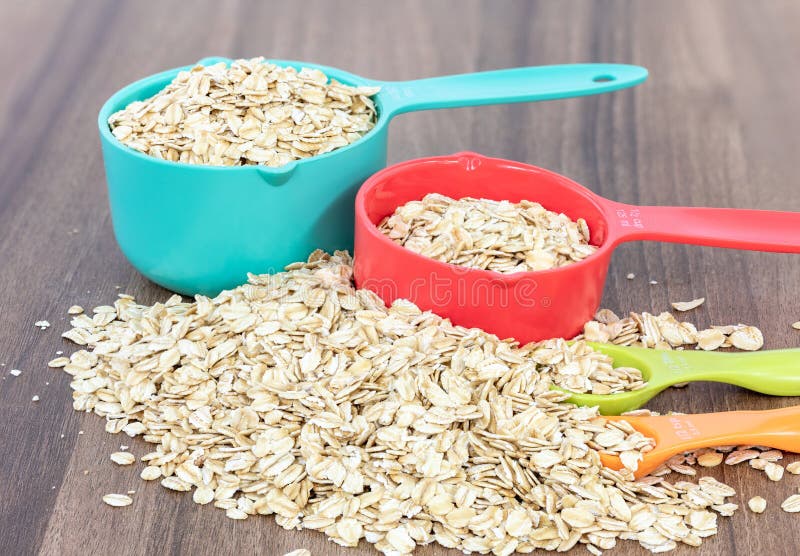 Oatmeal in Colorful Measuring Cups and