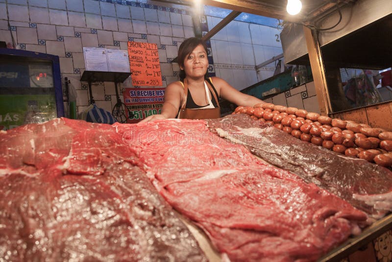 Woman selling meet on a local central market in Oaxaca, Mexico royalty free stock images Woman selling meet on a local central market in Oaxaca, Mexico royalty free stock images