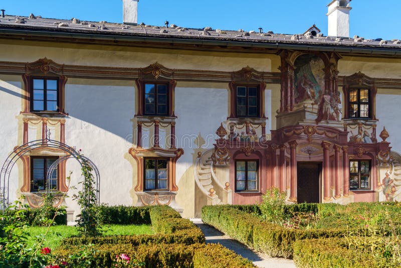 Obberamergau, Germany - October 15, 2017: House of Pilat with Luftlmalerei frescoes and tourists