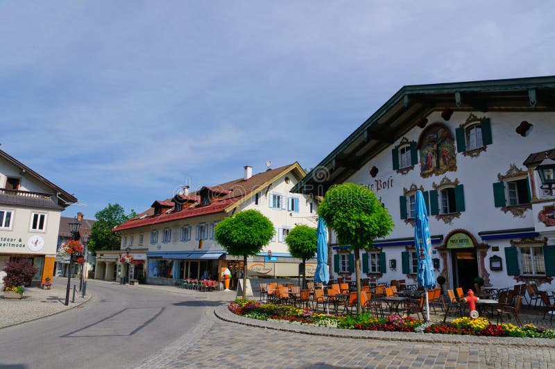 Oberammergau is a municipality in the district of Garmisch-Partenkirchen, in Bavaria, Germany. The town is known as the home of a long tradition of woodcarving. Oberammergau is a municipality in the district of Garmisch-Partenkirchen, in Bavaria, Germany. The town is known as the home of a long tradition of woodcarving.