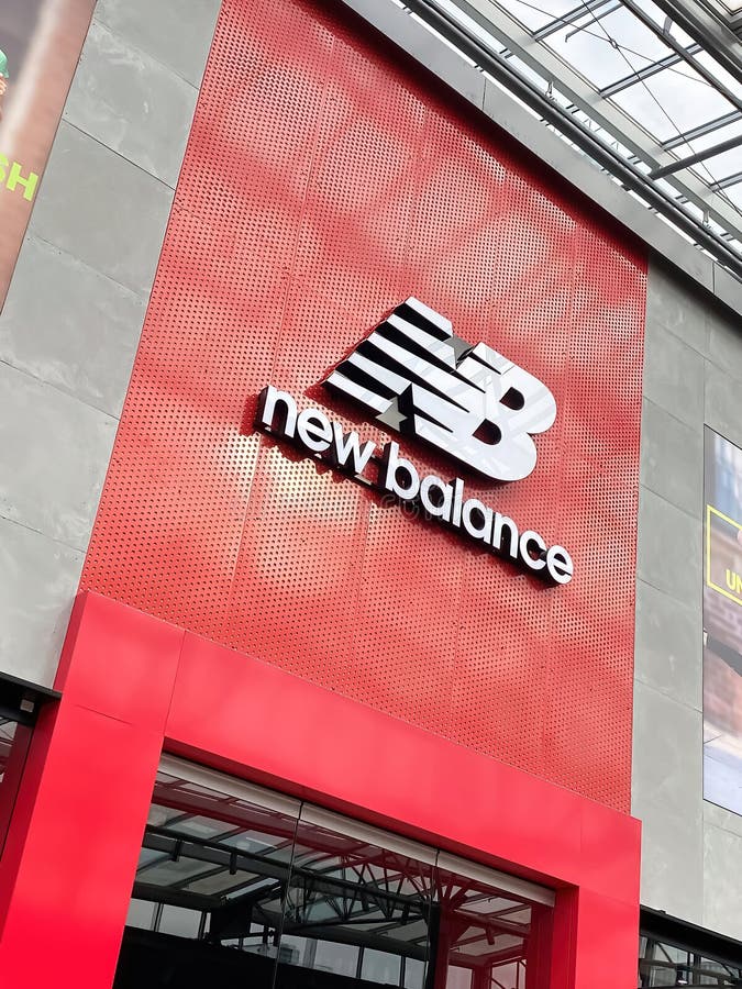 View on store front with logo lettering of new balance shoe fashion in shopping mall