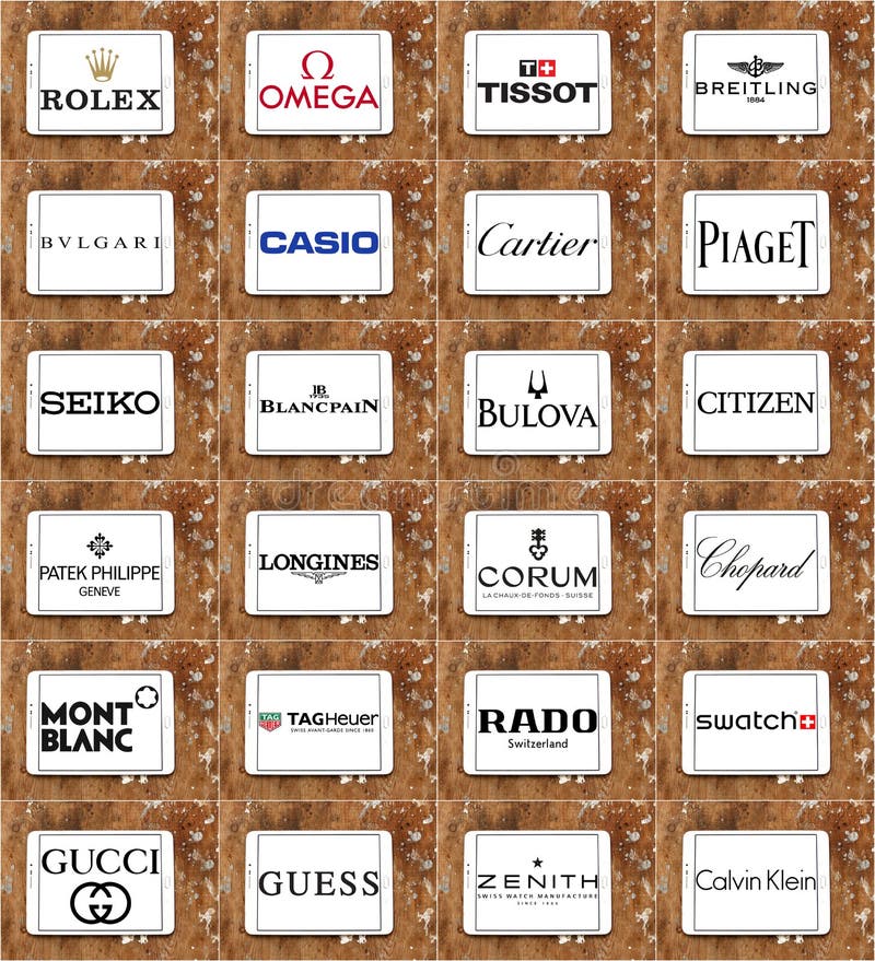 Collection of logos and brands of most popular luxury watches on white tablet on rusty wooden background. brands like omega, rolex, tissot, casio, piaget, rado. Collection of logos and brands of most popular luxury watches on white tablet on rusty wooden background. brands like omega, rolex, tissot, casio, piaget, rado