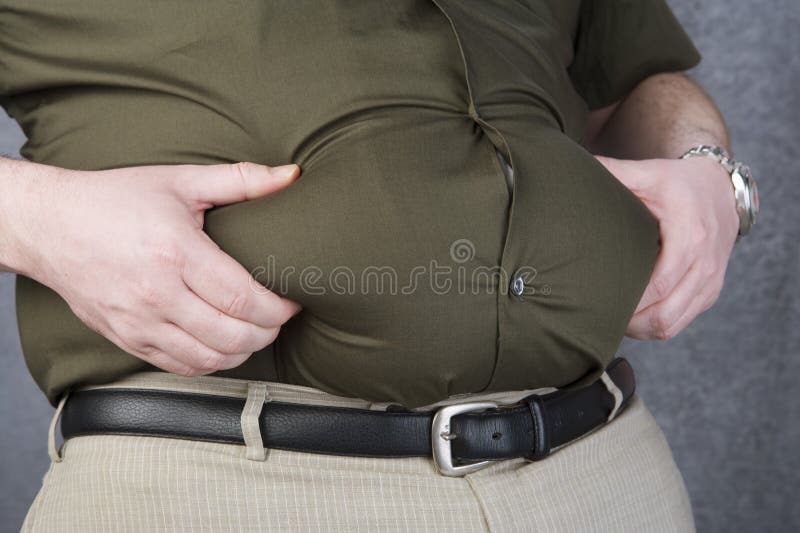 Obese Man Grabbing His Fat On The Stomach stock images Obese Man Grabbing His Fat On The Stomach stock images
