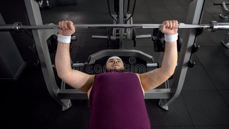 Upset Man Looking At His Fat Stomach, Desire To Lose Weight, Sport Gym