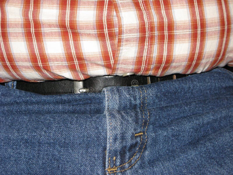 After lunch tight moments in tummy's life. Button clasp stock images, royalty-free photos and pictures