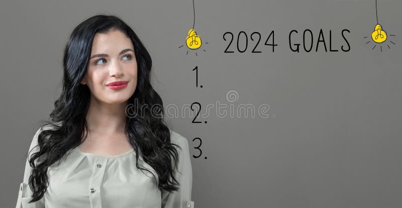 Obiettivi del 2024 con la giovane donna fotografia stock