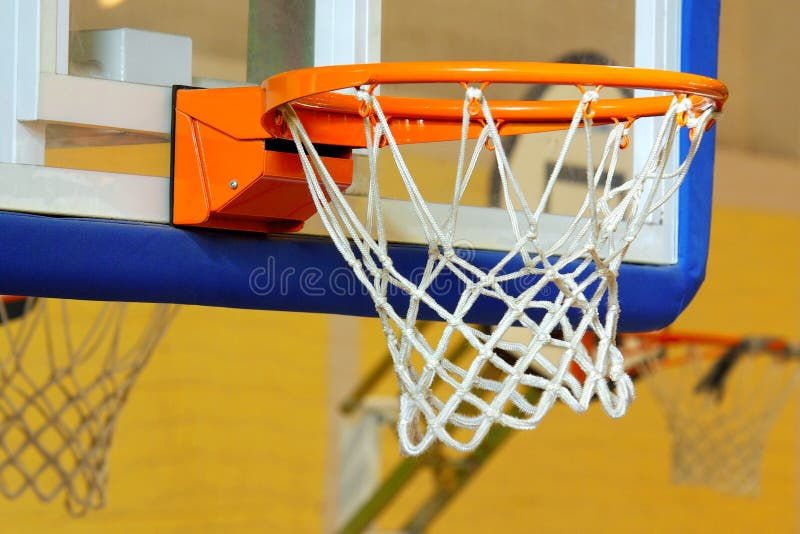 A glass basketball goal on a indoor sports facility. A glass basketball goal on a indoor sports facility