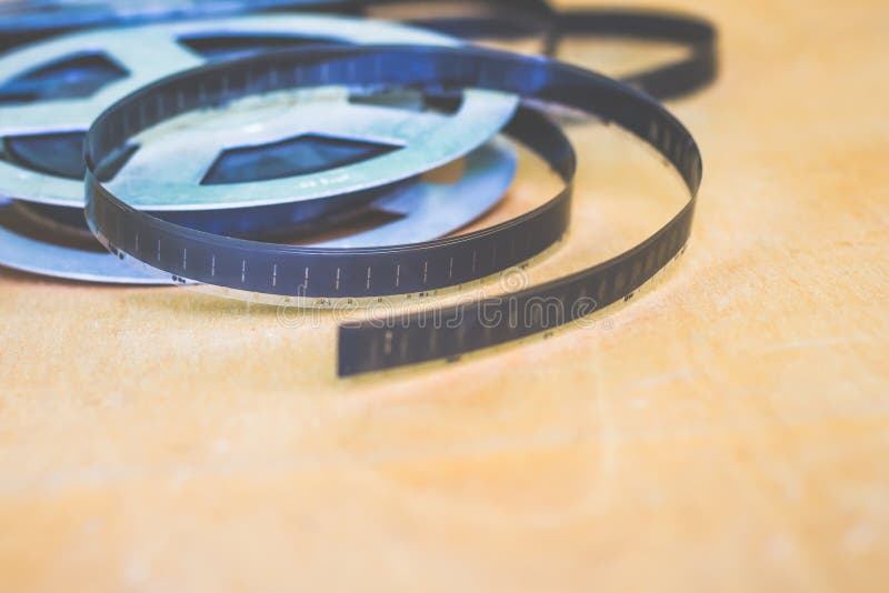 Object of antiquity: reel with an old film, shot on film, fro stock photos Object of antiquity: reel with an old film, shot on film, fro stock photos