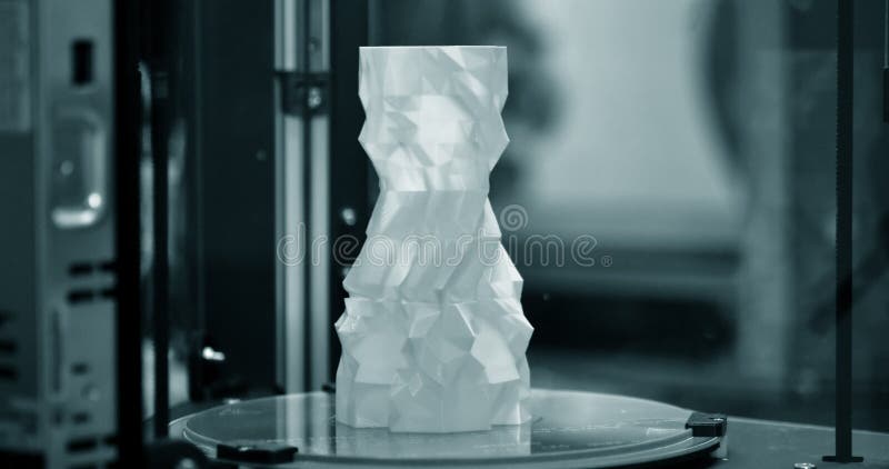 The object in the form of a blue vase stands on the desktop stock photography